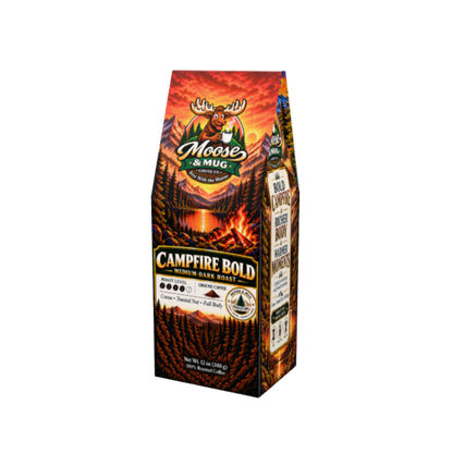 A package of Moose & Mug Campfire Bold coffee roasts, featuring a tall, tapered bag with a fiery red and orange sunset mountain landscape design on a plain white background.